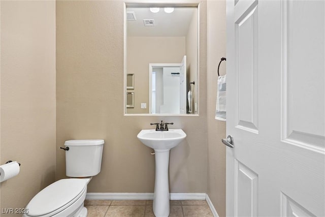 820 Colina Alta Pl, Las Vegas, NV 89138 - half bath featuring toilet, baseboards, tile patterned flooring, and a sink
