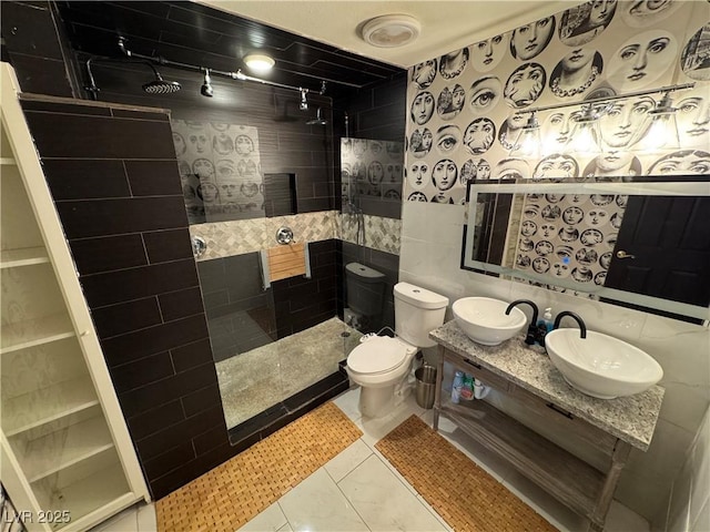 1819 Beverly Way, Las Vegas, NV 89104 - full bath featuring a walk in shower, toilet, double vanity, and tile walls