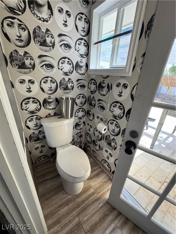 1819 Beverly Way, Las Vegas, NV 89104 - bathroom featuring toilet and wood finished floors