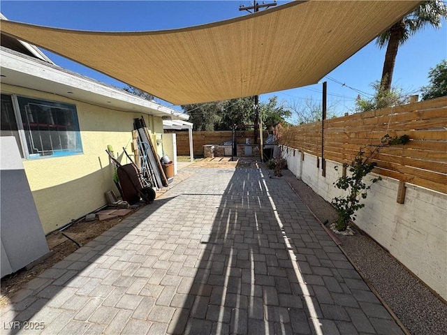 1819 Beverly Way, Las Vegas, NV 89104 - fenced backyard with a patio area