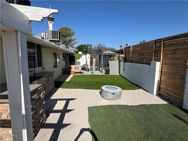1819 Beverly Way, Las Vegas, NV 89104 - view of yard featuring a patio area and central air condition unit