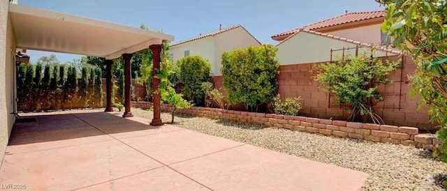 8159 Base Camp Ave, Las Vegas, NV 89178 - fenced backyard featuring a patio area