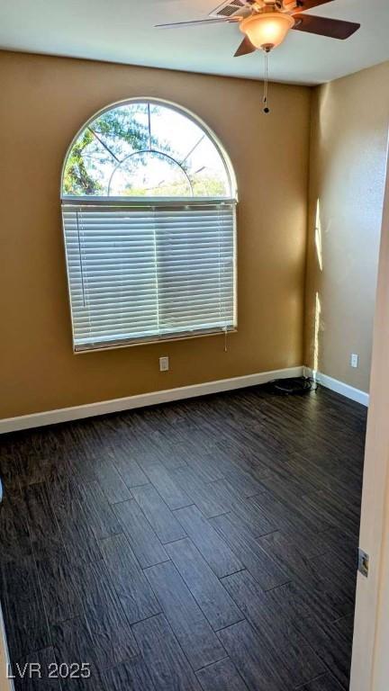 8159 Base Camp Ave, Las Vegas, NV 89178 - empty room with ceiling fan and dark wood finished floors