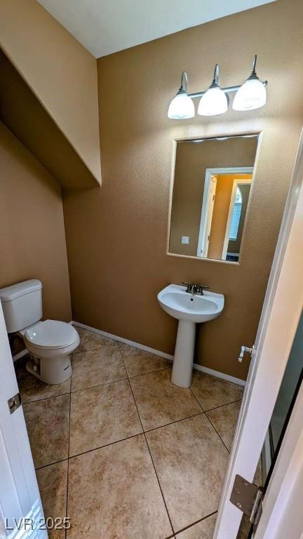 8159 Base Camp Ave, Las Vegas, NV 89178 - bathroom with toilet and tile patterned floors