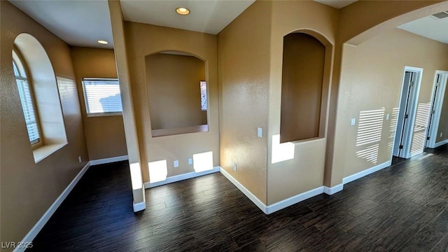 8159 Base Camp Ave, Las Vegas, NV 89178 - hall featuring dark wood-style floors, recessed lighting, and arched walkways