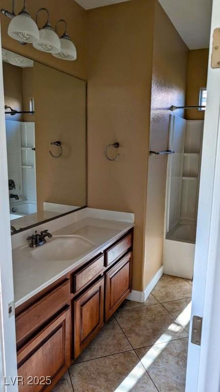 8159 Base Camp Ave, Las Vegas, NV 89178 - bathroom with vanity, tile patterned flooring, and  shower combination