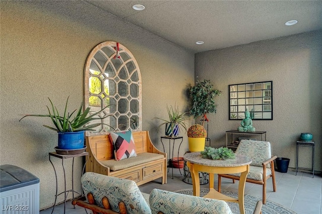2669 Via Monet, Henderson, NV 89044 - sitting room with a textured wall, recessed lighting, and tile patterned floors