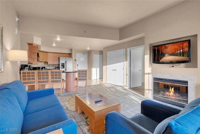 211 E Flamingo Rd Unit 1617, Las Vegas, NV 89169 - living area featuring a tiled fireplace and recessed lighting