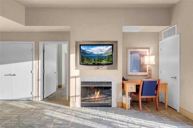 211 E Flamingo Rd Unit 1617, Las Vegas, NV 89169 - living area with a tile fireplace and baseboards