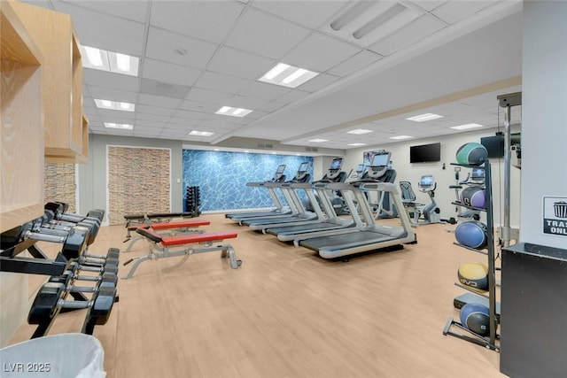 211 E Flamingo Rd Unit 1617, Las Vegas, NV 89169 - workout area with a drop ceiling and wood finished floors