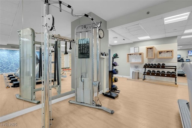 211 E Flamingo Rd Unit 1617, Las Vegas, NV 89169 - workout area with wood finished floors, baseboards, and a drop ceiling