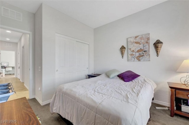 2613 Velodrome Ct, Henderson, NV 89044 - bedroom with carpet flooring, baseboards, and a closet