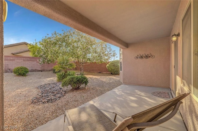 2613 Velodrome Ct, Henderson, NV 89044 - fenced backyard with a patio