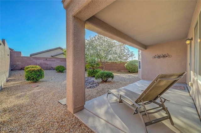 2613 Velodrome Ct, Henderson, NV 89044 - fenced backyard with a patio area