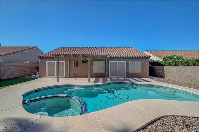 2711 Briarcliff Ave, Henderson, NV 89074 - view of swimming pool featuring a pool with connected hot tub, a patio area, and a pergola