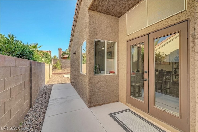2711 Briarcliff Ave, Henderson, NV 89074 - fenced backyard with french doors and a patio area