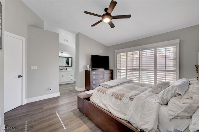 2711 Briarcliff Ave, Henderson, NV 89074 - bedroom with wood finished floors, baseboards, high vaulted ceiling, ensuite bath, and a ceiling fan