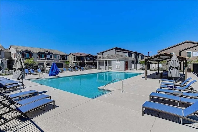 7332 N Decatur Blvd Unit 2, North Las Vegas, NV 89084 - community pool featuring a residential view and a patio