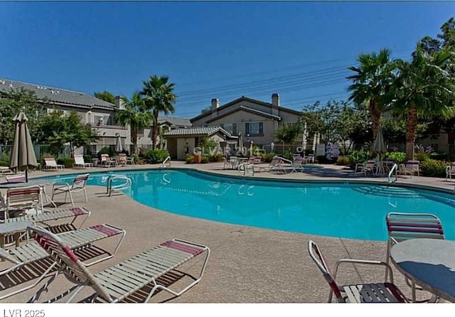 5710 E Tropicana Ave Unit 2178, Las Vegas, NV 89122 - community pool with a patio area