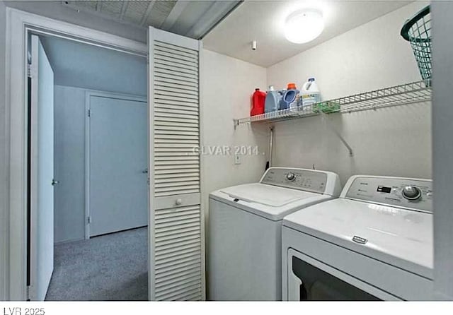 5710 E Tropicana Ave Unit 2178, Las Vegas, NV 89122 - laundry area with washing machine and clothes dryer and carpet flooring