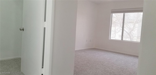 5710 E Tropicana Ave Unit 2178, Las Vegas, NV 89122 - unfurnished room with carpet floors and baseboards