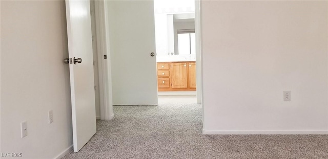 5710 E Tropicana Ave Unit 2178, Las Vegas, NV 89122 - corridor with carpet and baseboards