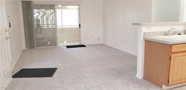 5710 E Tropicana Ave Unit 2178, Las Vegas, NV 89122 - entryway featuring carpet flooring and baseboards