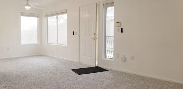 5710 E Tropicana Ave Unit 2178, Las Vegas, NV 89122 - carpeted foyer with ceiling fan and baseboards