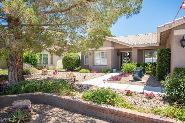 6417 Fisher Ave, Las Vegas, NV 89130 - view of front of property featuring stucco siding and a tiled roof
