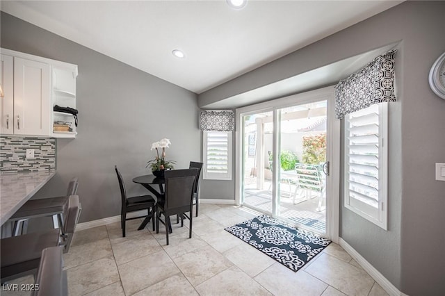 6417 Fisher Ave, Las Vegas, NV 89130 - dining space featuring baseboards, recessed lighting, and light tile patterned floors