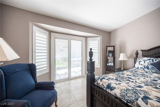 6417 Fisher Ave, Las Vegas, NV 89130 - bedroom featuring access to outside and light tile patterned flooring