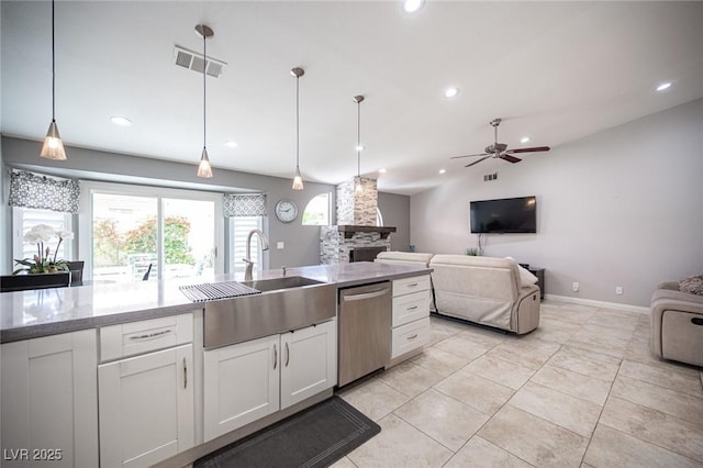 6417 Fisher Ave, Las Vegas, NV 89130 - kitchen with dishwasher, a sink, ceiling fan, recessed lighting, and white cabinetry