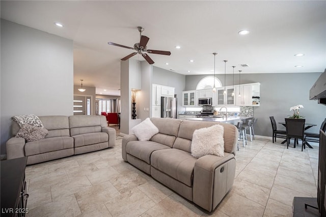 6417 Fisher Ave, Las Vegas, NV 89130 - living area featuring recessed lighting, a ceiling fan, and baseboards