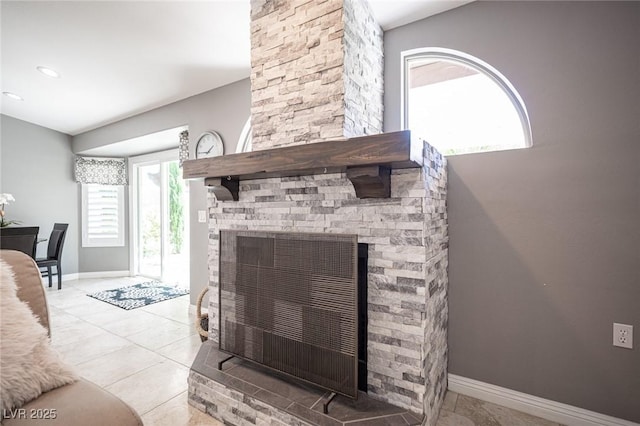 6417 Fisher Ave, Las Vegas, NV 89130 - living area featuring a fireplace, baseboards, and tile patterned flooring