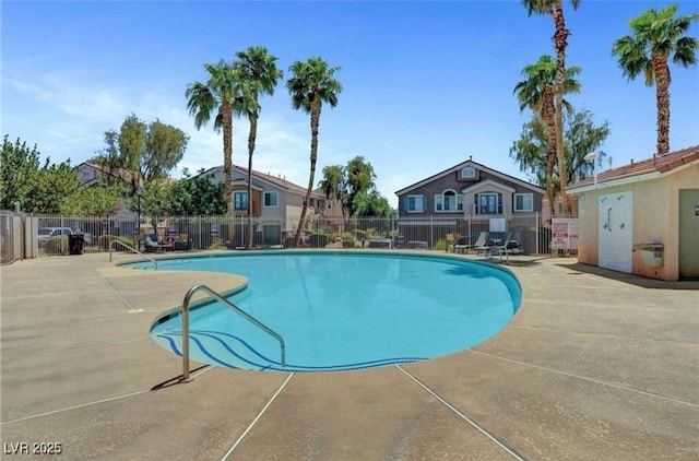 3041 Gary Cooper St Unit 103, Las Vegas, NV 89122 - community pool featuring a patio area