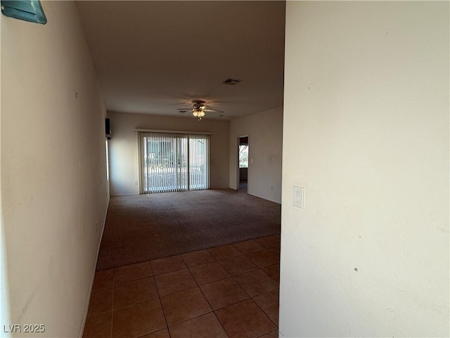 3508 Kittiwake Rd, North Las Vegas, NV 89084 - hall featuring carpet floors and tile patterned floors