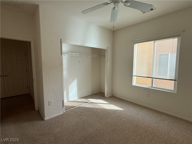 3508 Kittiwake Rd, North Las Vegas, NV 89084 - unfurnished bedroom featuring a closet, carpet, ceiling fan, and baseboards