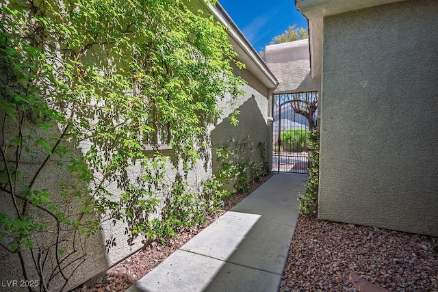 5017 Kaibab Forest Ave, Las Vegas, NV 89141 - view of side of property featuring a gate and stucco siding