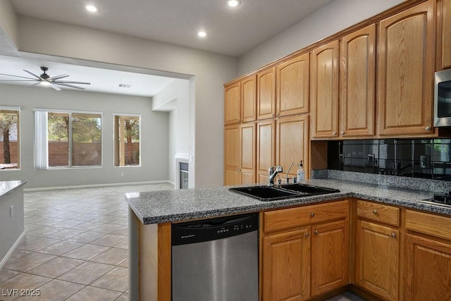 5017 Kaibab Forest Ave, Las Vegas, NV 89141 - kitchen with stainless steel appliances, a sink, a ceiling fan, light tile patterned floors, and recessed lighting