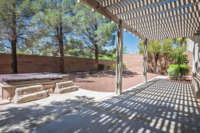 5017 Kaibab Forest Ave, Las Vegas, NV 89141 - fenced backyard with a patio area, a covered hot tub, and a pergola
