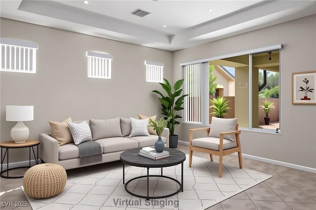 5017 Kaibab Forest Ave, Las Vegas, NV 89141 - living room with a raised ceiling, recessed lighting, light tile patterned floors, and baseboards