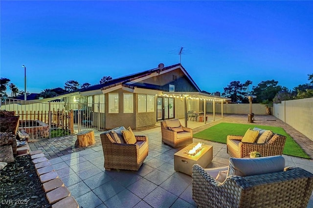 58 Pleasant Dale Dr, Henderson, NV 89074 - fenced backyard with a fire pit and a patio area