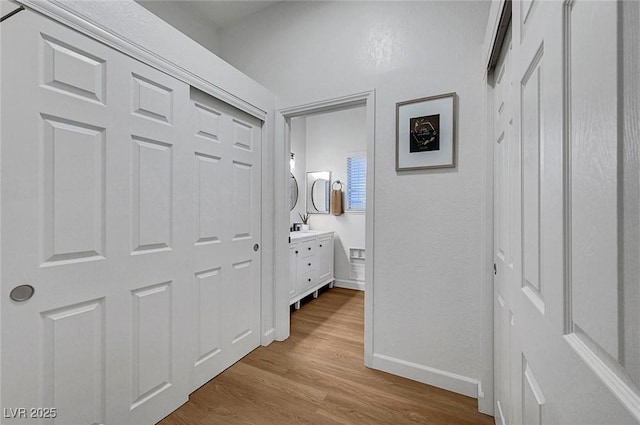 58 Pleasant Dale Dr, Henderson, NV 89074 - hall with baseboards and wood finished floors