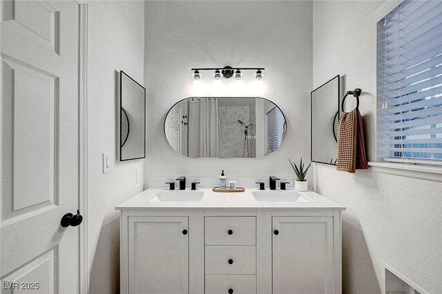 58 Pleasant Dale Dr, Henderson, NV 89074 - bathroom with double vanity and a shower