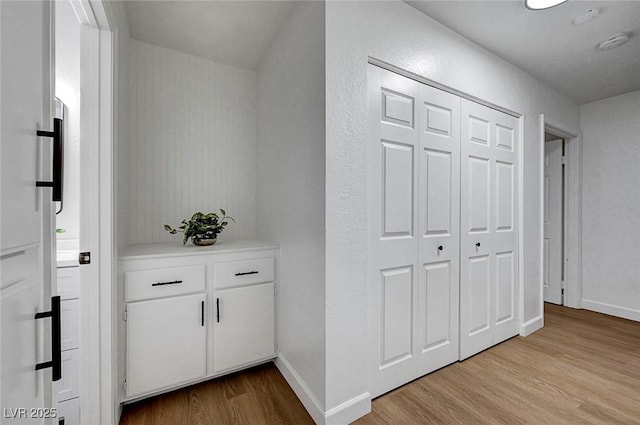 58 Pleasant Dale Dr, Henderson, NV 89074 - hallway featuring wood finished floors and baseboards