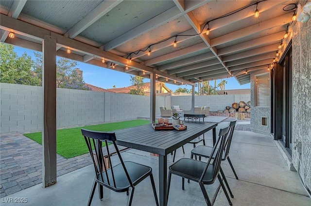 58 Pleasant Dale Dr, Henderson, NV 89074 - fenced backyard featuring a patio area and outdoor dining area