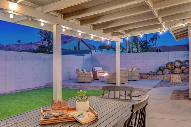 58 Pleasant Dale Dr, Henderson, NV 89074 - patio at twilight with a fenced backyard, a wooden deck, and a patio