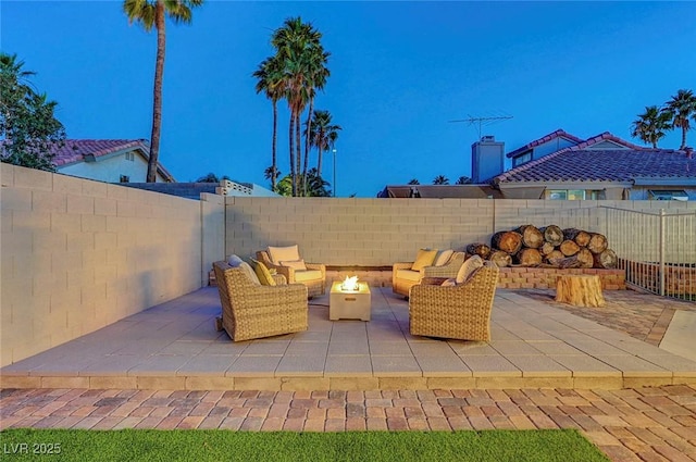 58 Pleasant Dale Dr, Henderson, NV 89074 - fenced backyard with an outdoor living space with a fire pit and a patio area