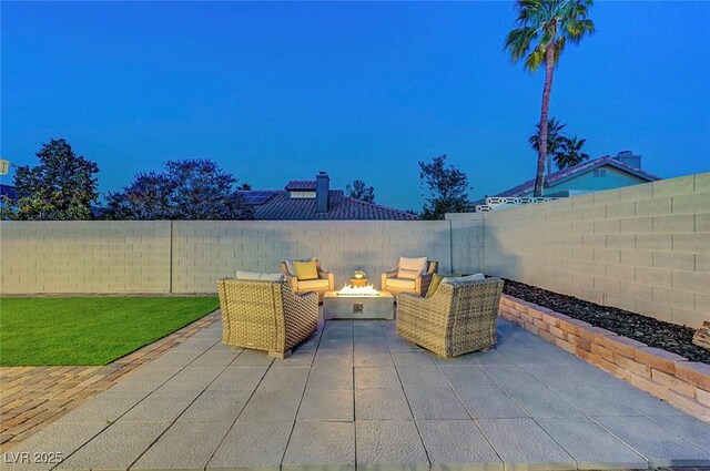 58 Pleasant Dale Dr, Henderson, NV 89074 - fenced backyard featuring an outdoor fire pit and a patio