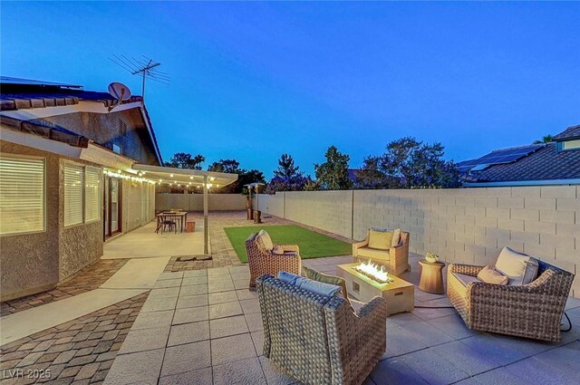 58 Pleasant Dale Dr, Henderson, NV 89074 - fenced backyard featuring a fire pit and a patio